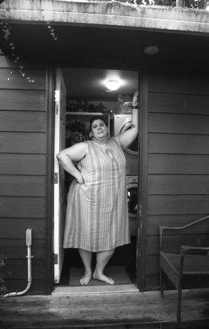 Marina standing in a doorway